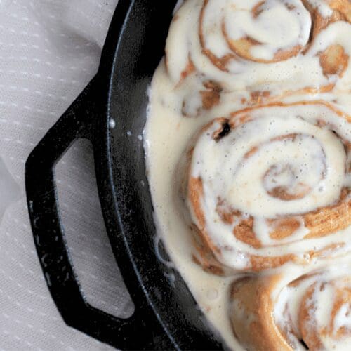 Sourdough cinnamon rolls in cast iron skillet