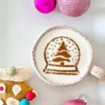 Coffee with snow globe coffee art