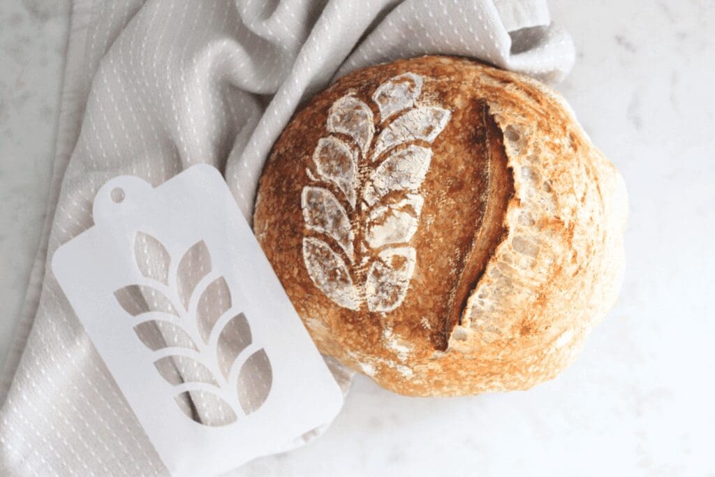 Sourdough bread art stencil shown with sourdough boule