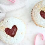 Valentine's Day heart cupcakes filled displayed heart cookie cutters.
