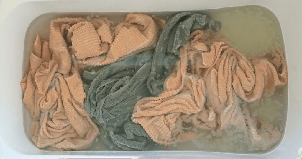 Towels soaking in a bathtub