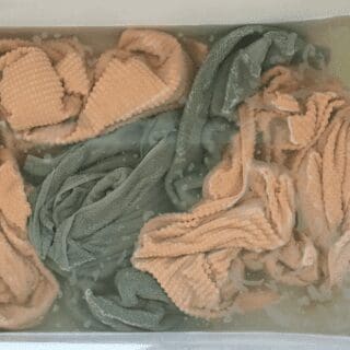 Towels soaking in a bathtub