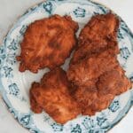 sourdough fried chicken on decorative plate