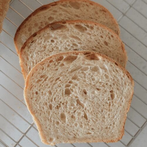 Three slices of bread on cooling rack