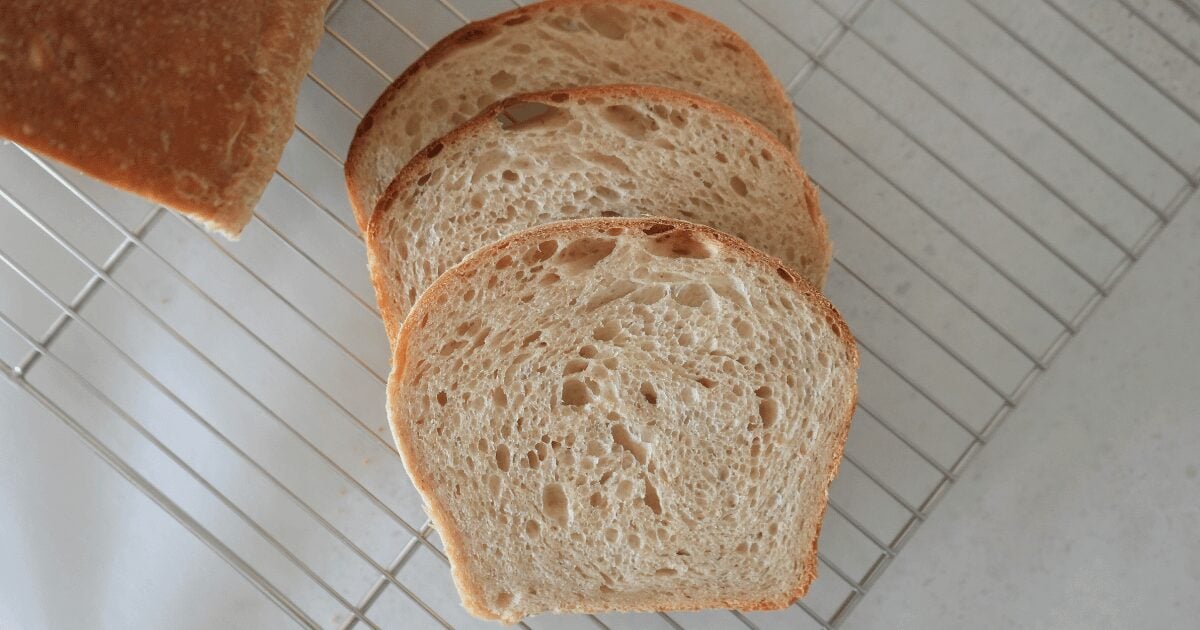 Three slices of bread on cooling rack