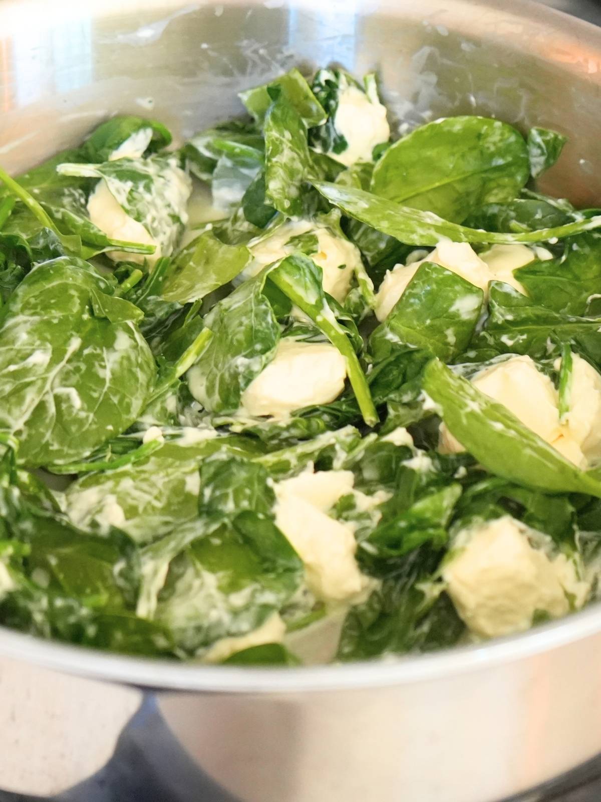 Melted cream cheese combined with spinach.