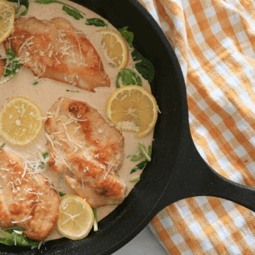 Creamy lemon chicken in cast iron skillet