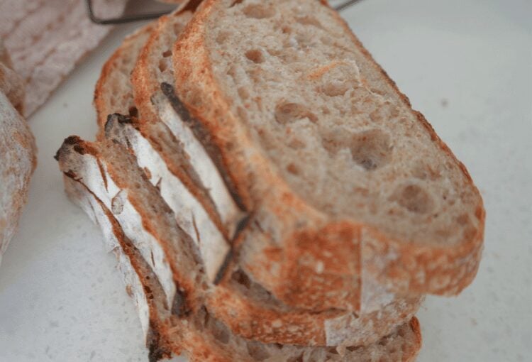Stack of sliced sourdough bread