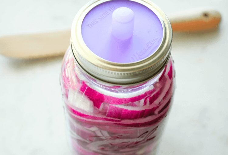 Fermented red onions in mason jar