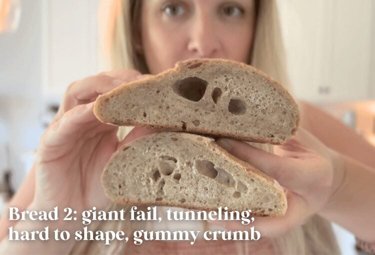 Woman holding under-proofed sourdough bread