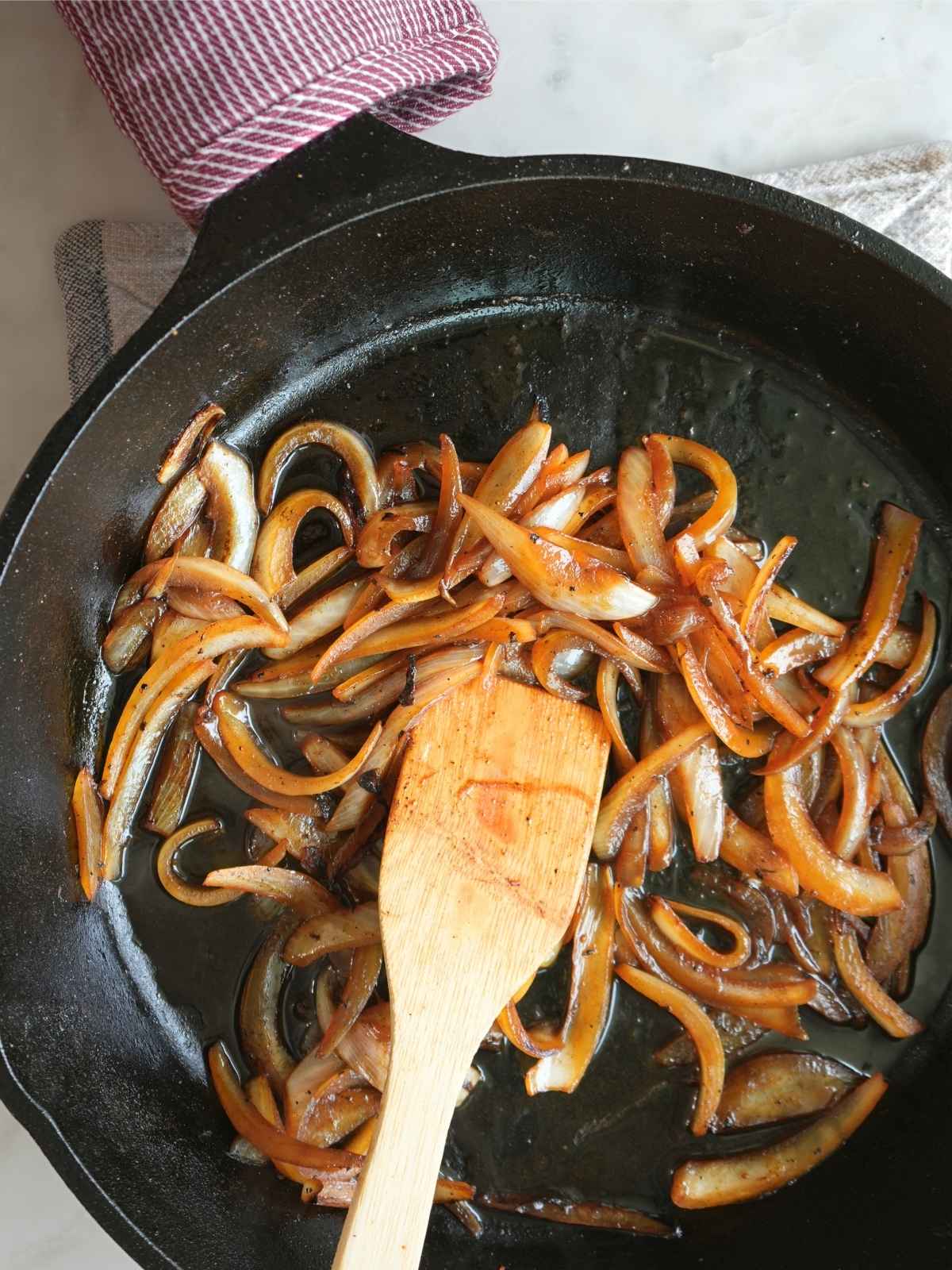 Caramelized onions in a cast iron skillet.