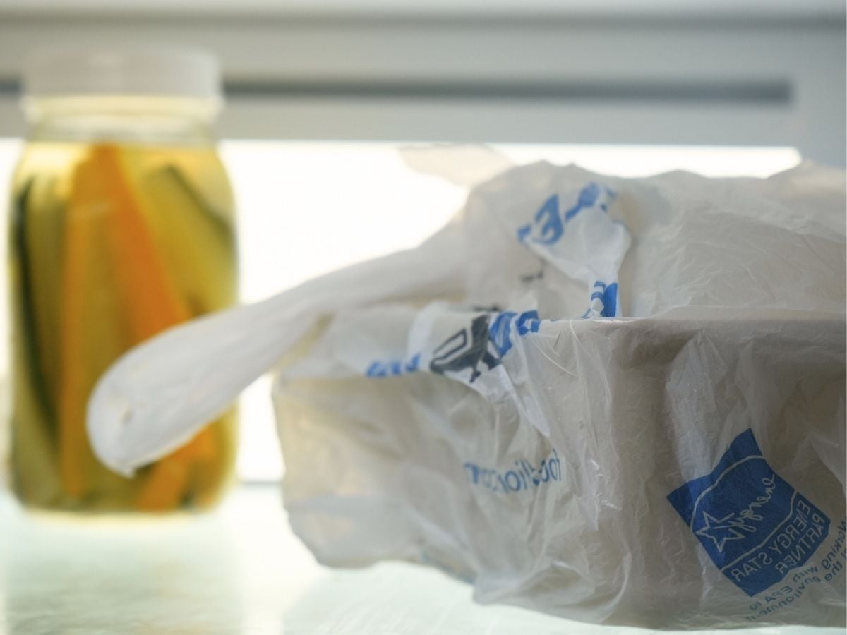 Covered dough in a refrigerator.