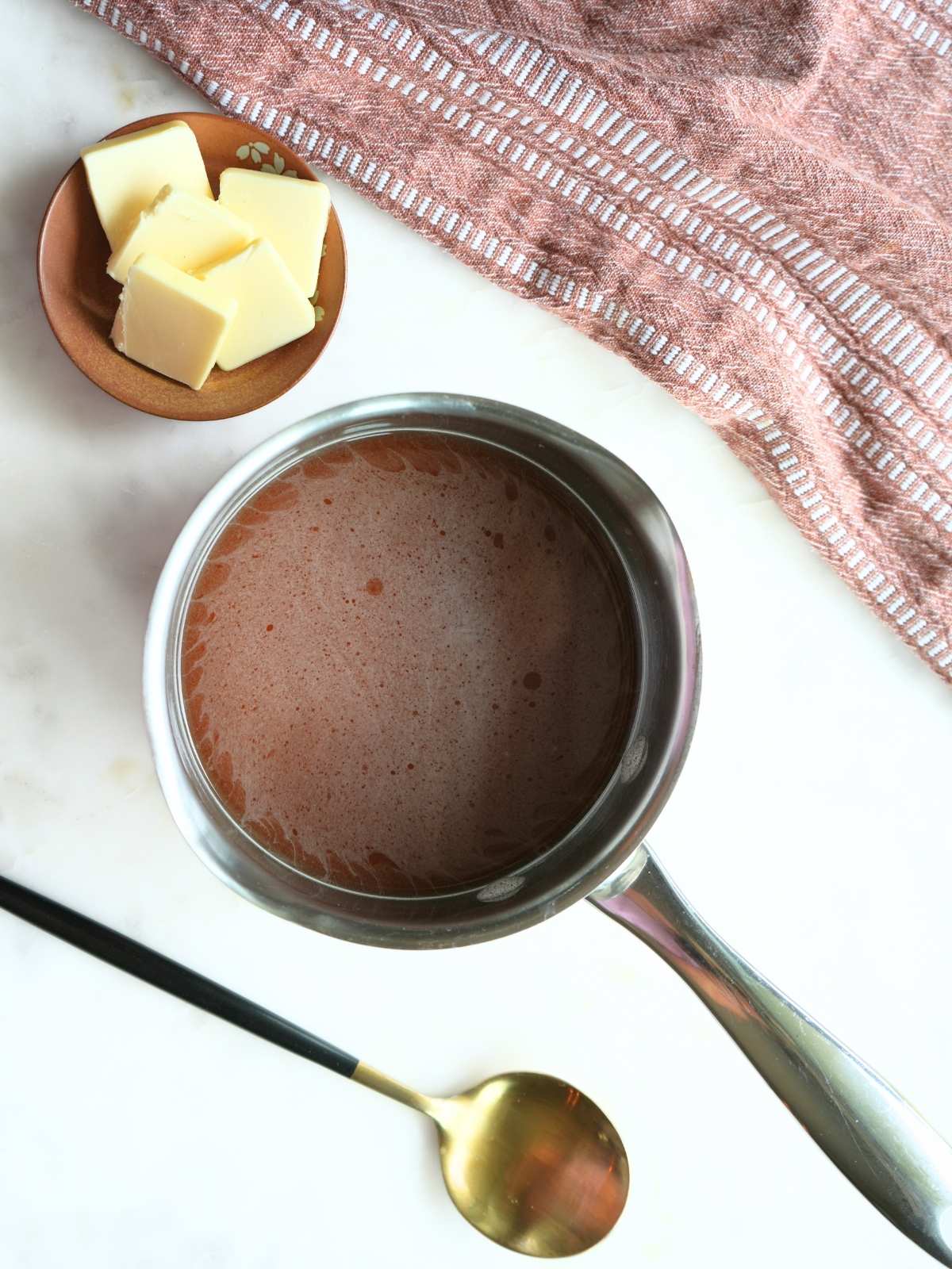 Molasses syrup ingredients in a saucepan.