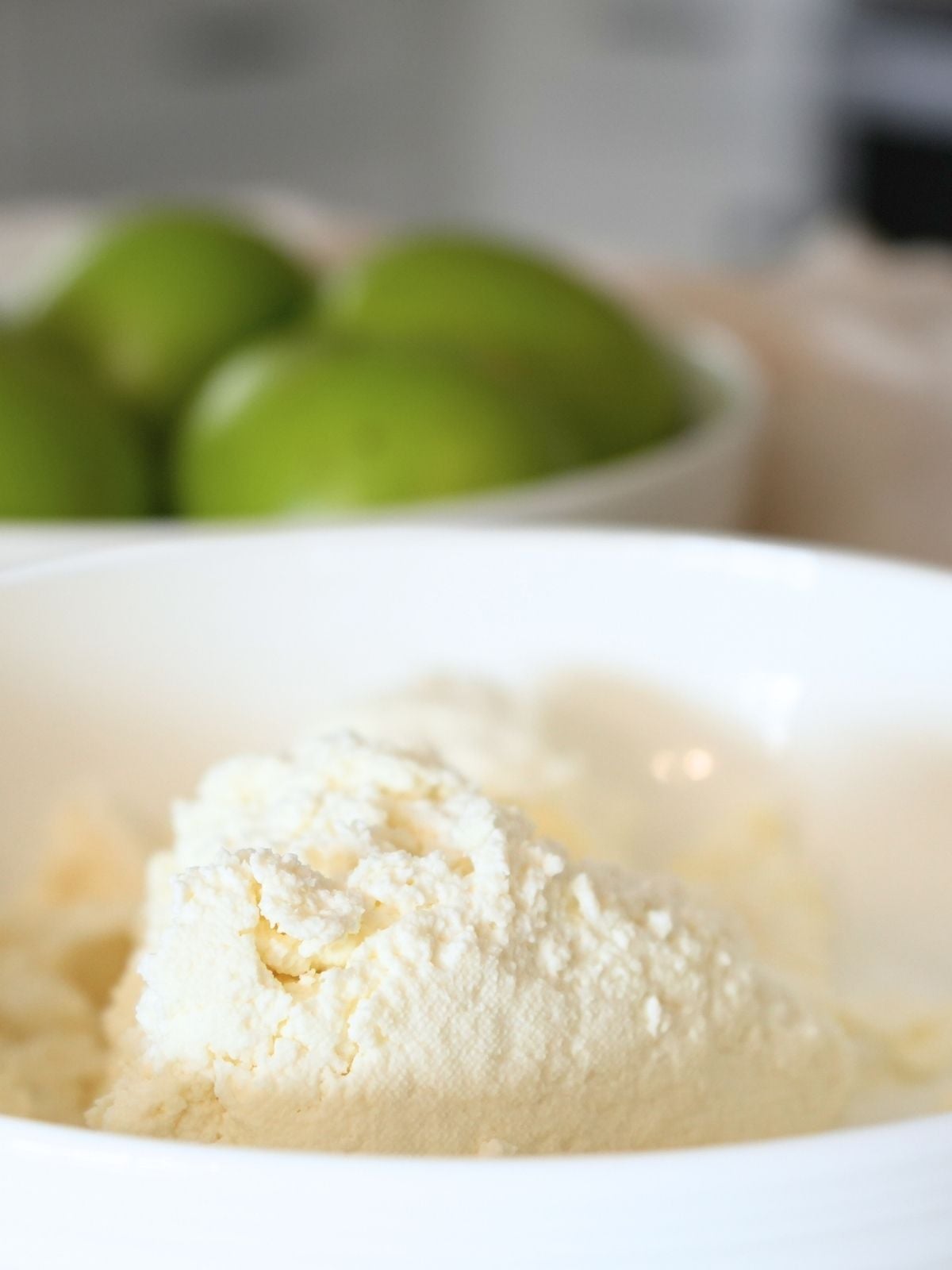 Cottage cheese curds in bowl.