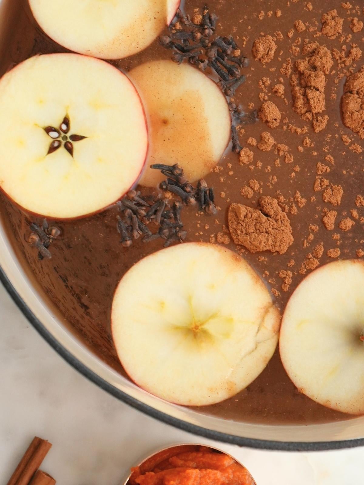 Apples in a fall simmer pot mixture.