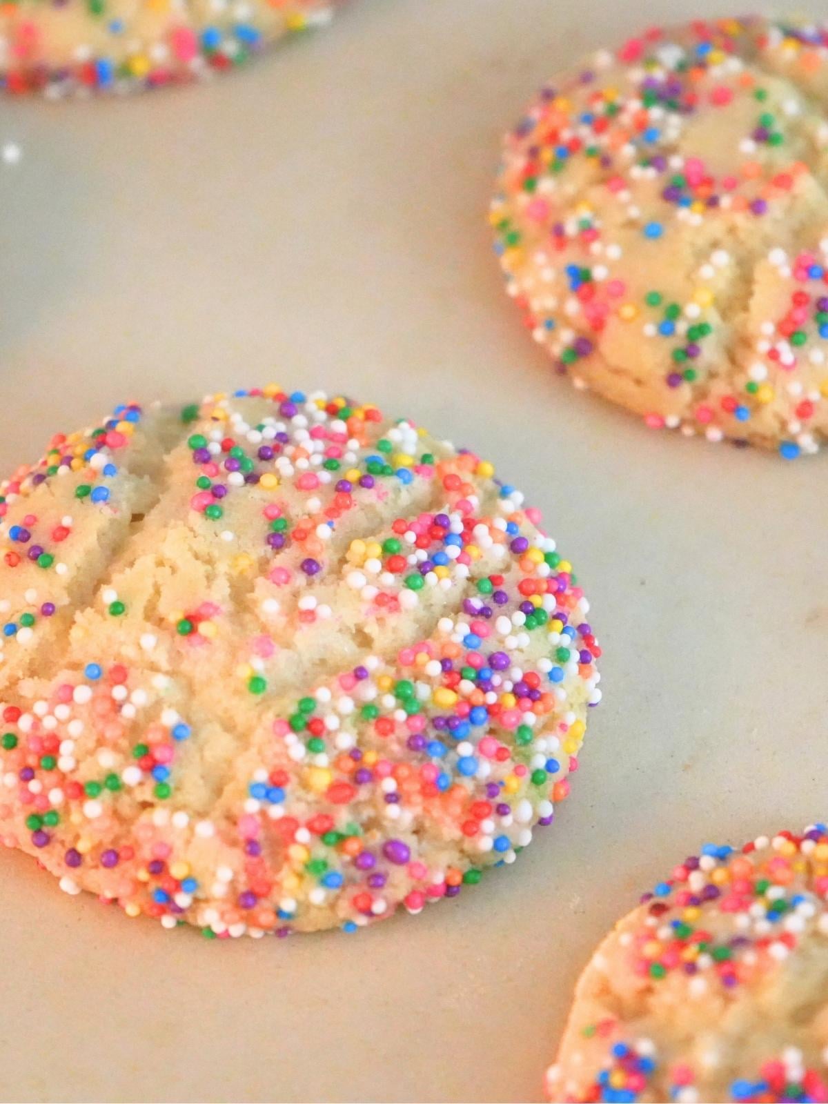 Sprinkle cookies on a baking sheet.