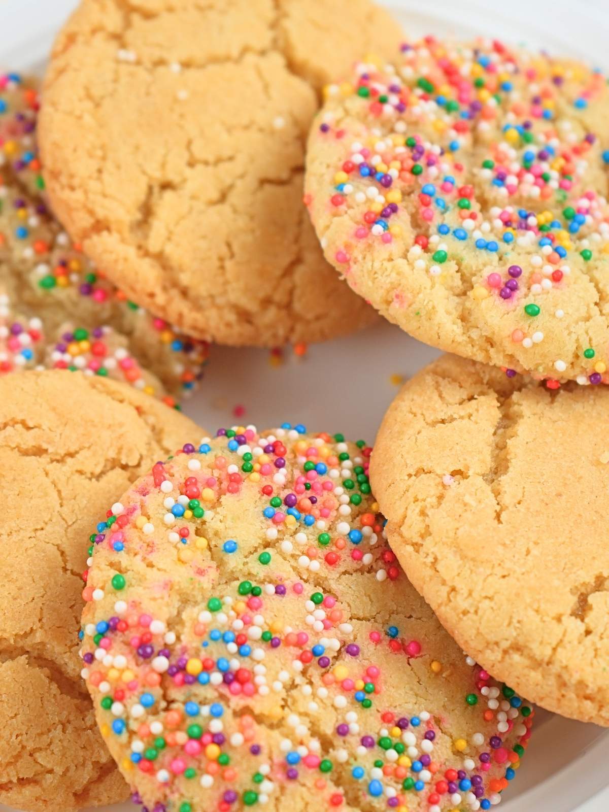 Sugar cookies arranged on a plate.