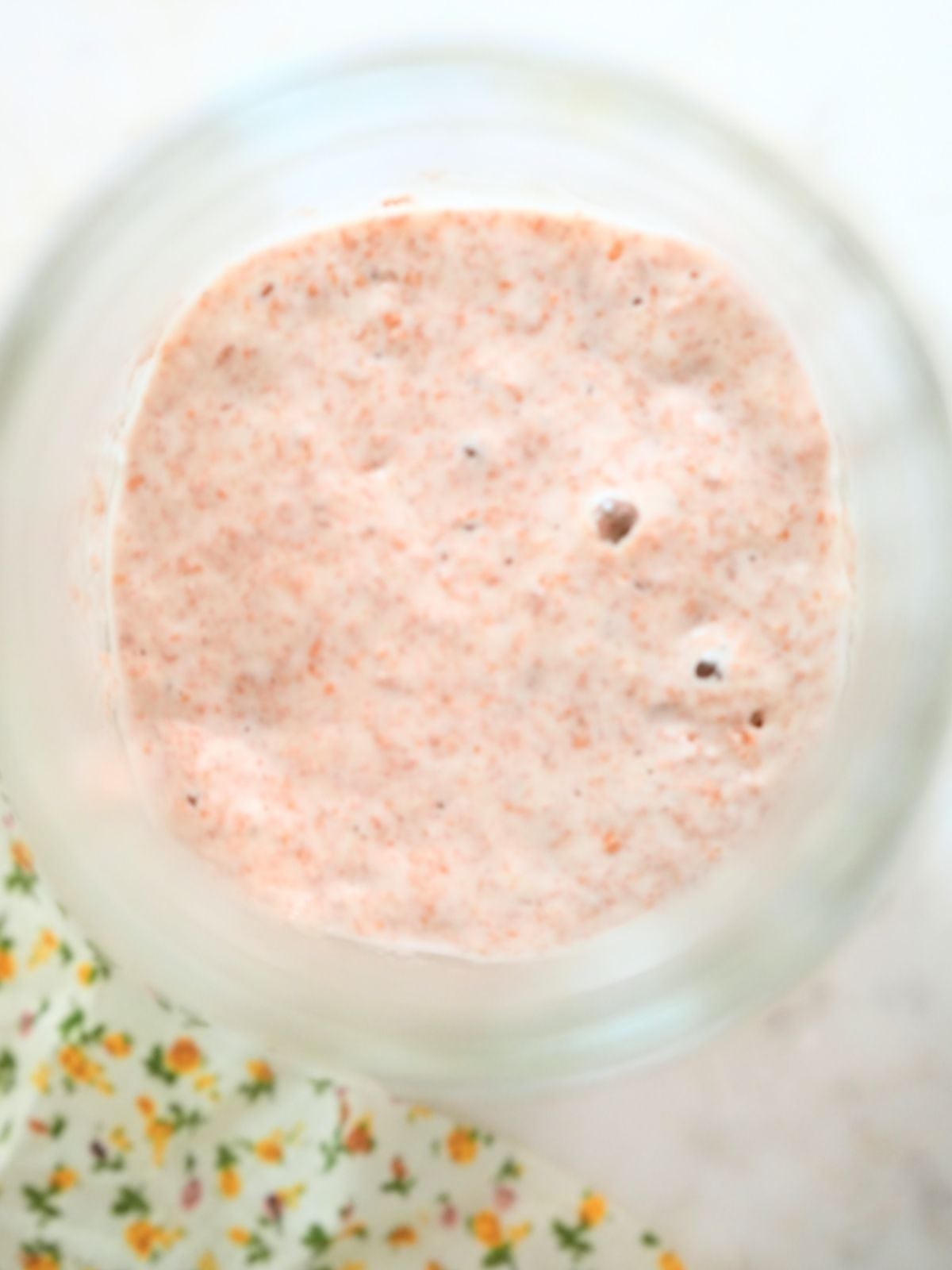 A jar of bubbly sourdough starter.