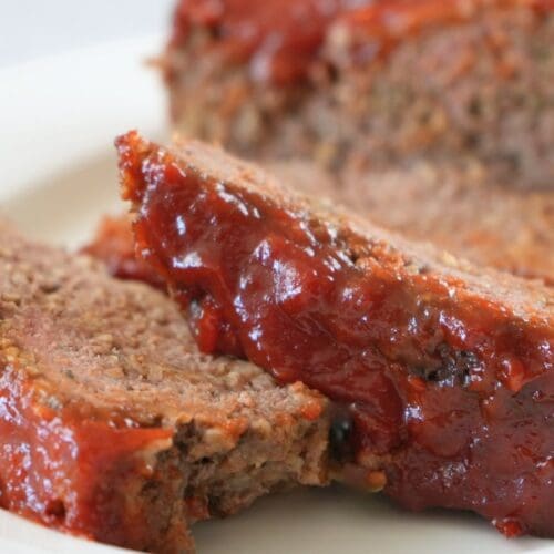 Slices of meatloaf topped with a layer of hot honey sauce.