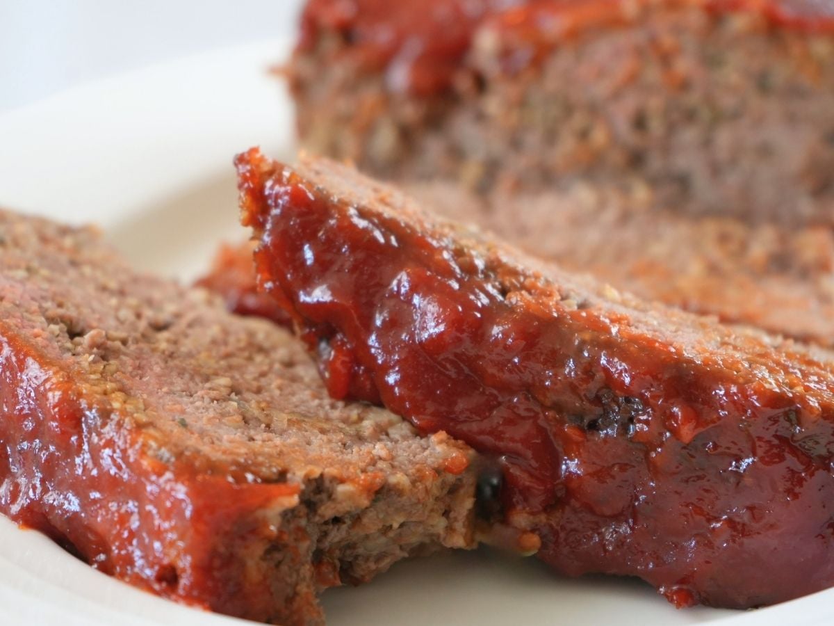 Slices of meatloaf topped with a layer of hot honey sauce.