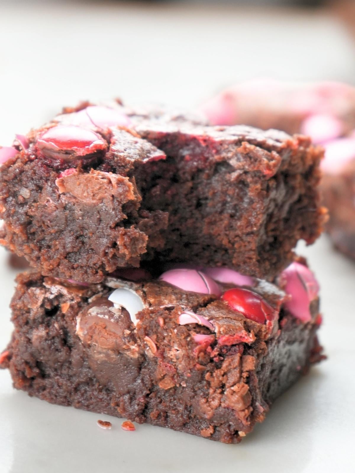 Two stacked sourdough Valentine's brownies.