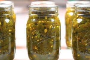 Candied jalapenos canning recipe example in ball jars
