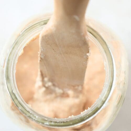 Thick sourdough starter on a spurtle.