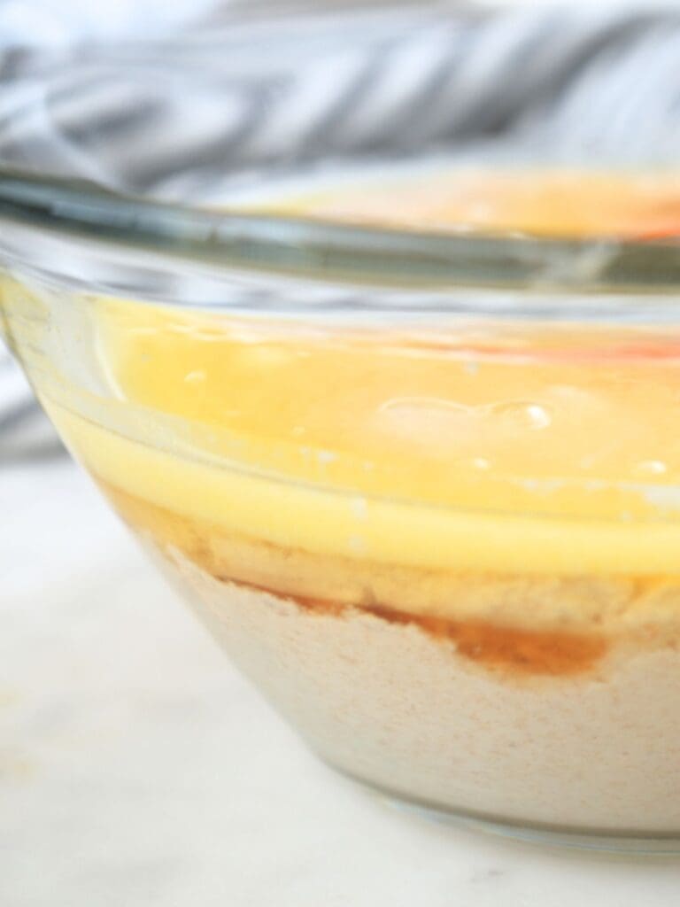 Sourdough discard pancake ingredients in a bowl.