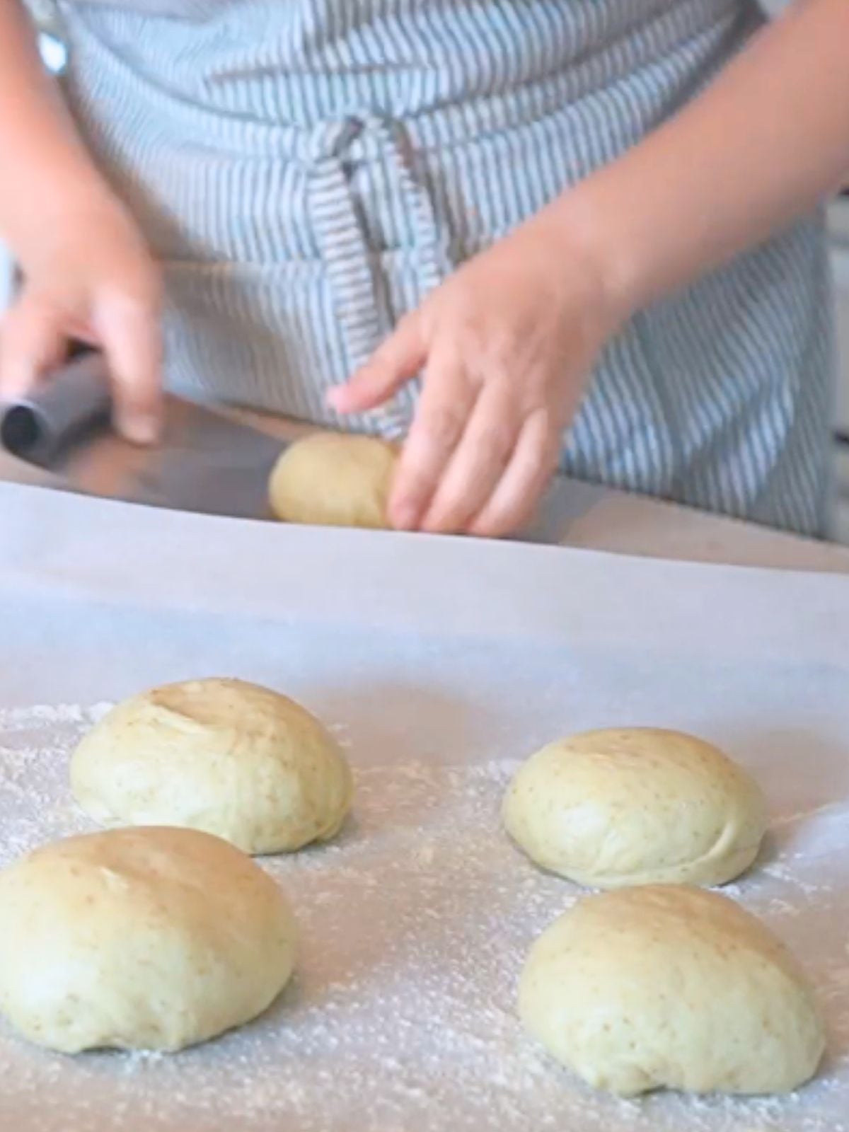 Dough balls on baking sheet.