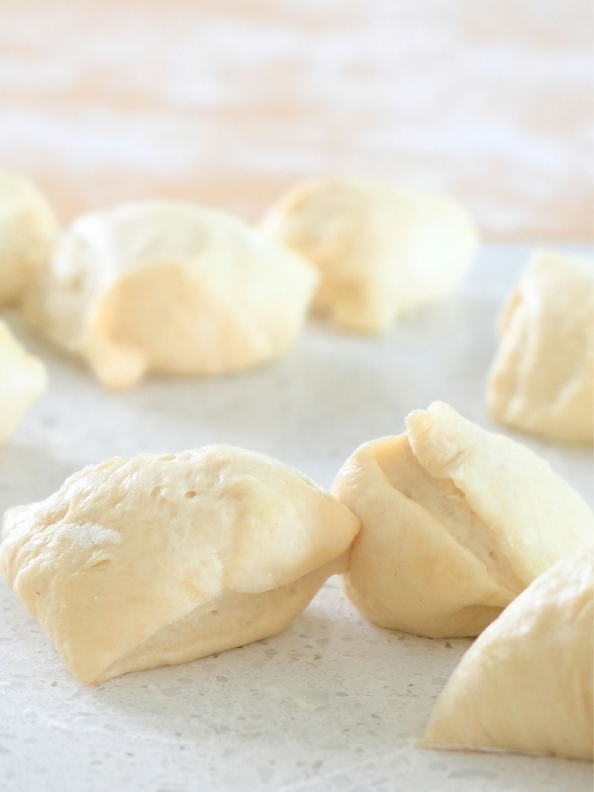 Dough divided into small pieces.