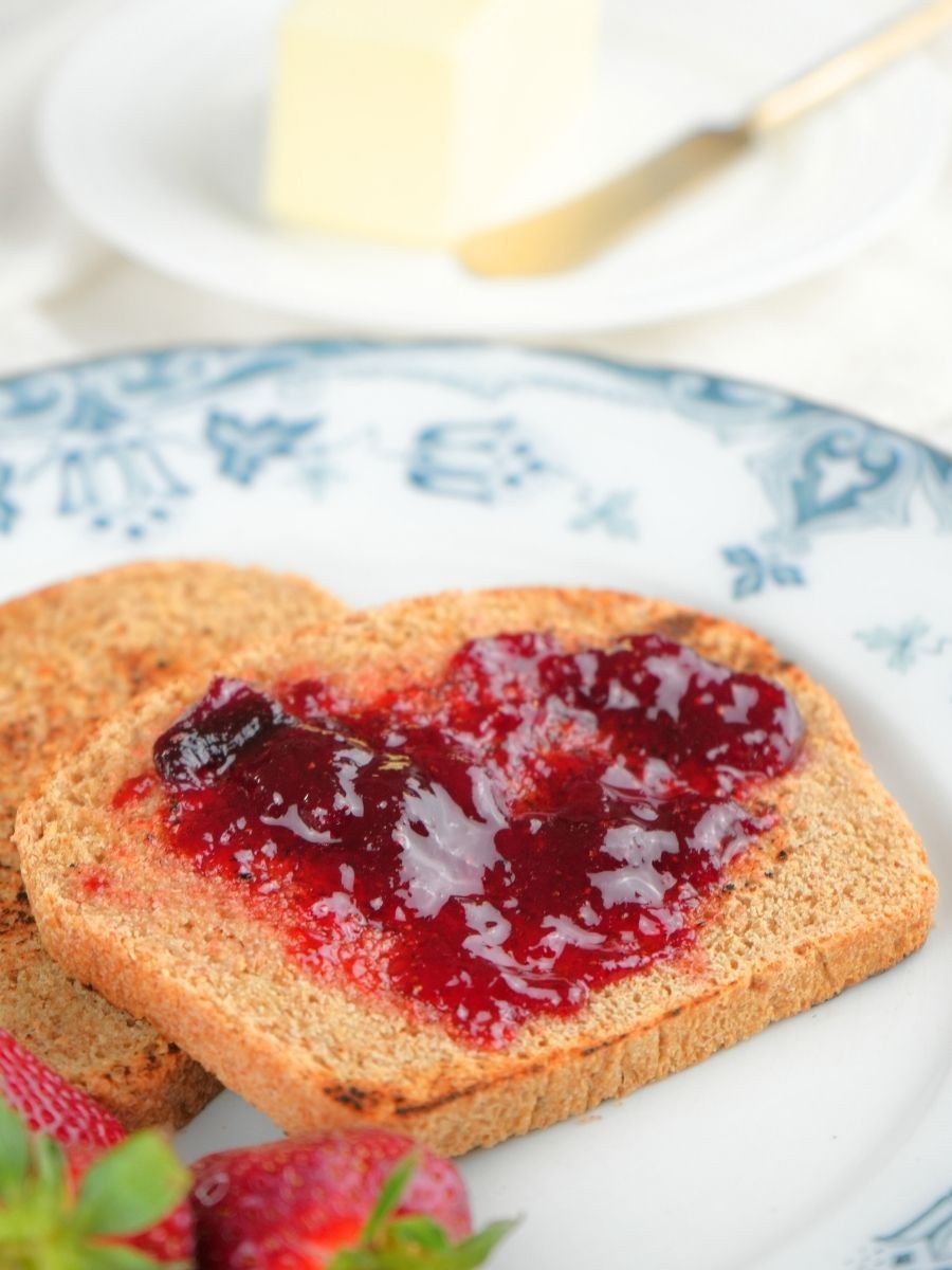 Strawberry Jam spread on a piece of toast