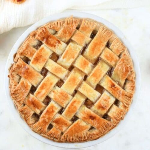 Overhead view of a latticed pie made with sourdough pie crust