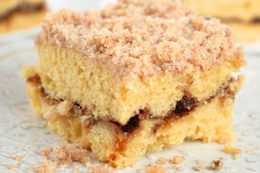 A slice of sourdough discard coffee cake on a decorative plate