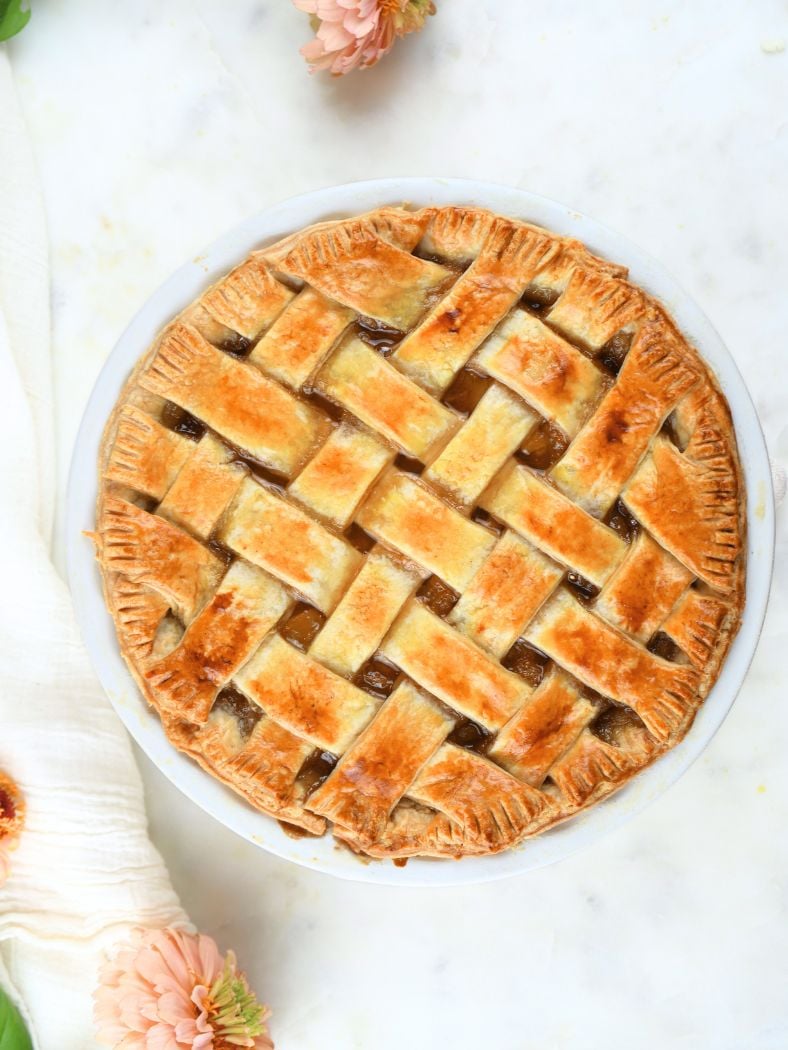 An overhead view of a lattice pie made with sourdough pie crust