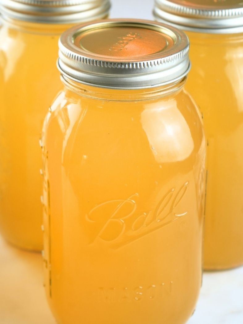 Jars of home-canned chicken stock