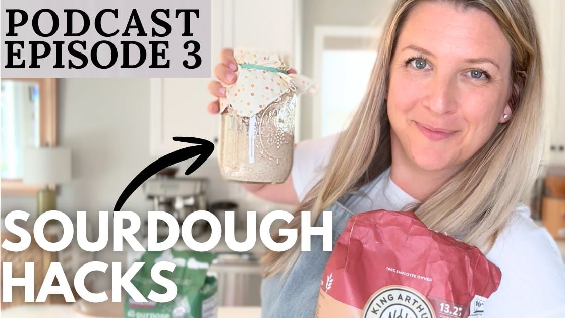 A woman holding sourdough starter and a bag of flour. Text overlay "Sourdough Hacks"