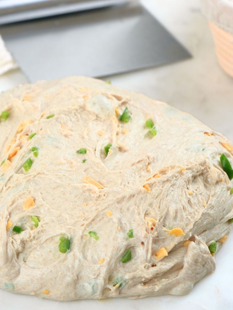 Fermented dough turned out onto a counter