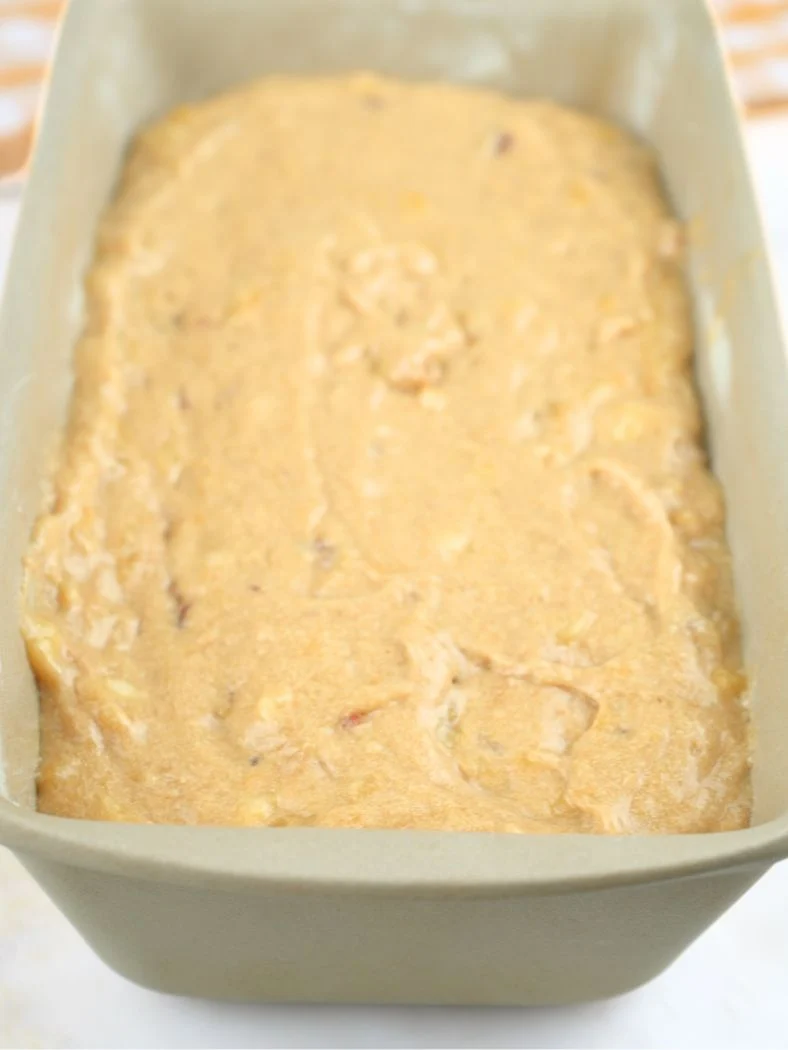 Sourdough banana bread batter in a stone loaf pan