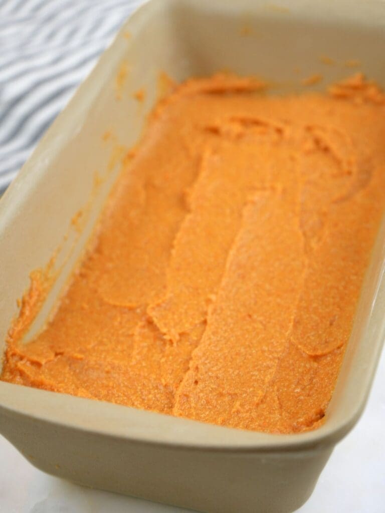 Fresh-milled pumpkin bread batter in a loaf pan.