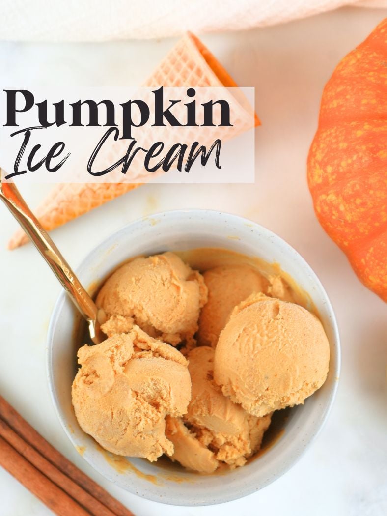 A bowl filled with ice cream next to a pumpkin, cone, and cinnamon sticks. Text overlay says, "Pumpkin Ice Cream."