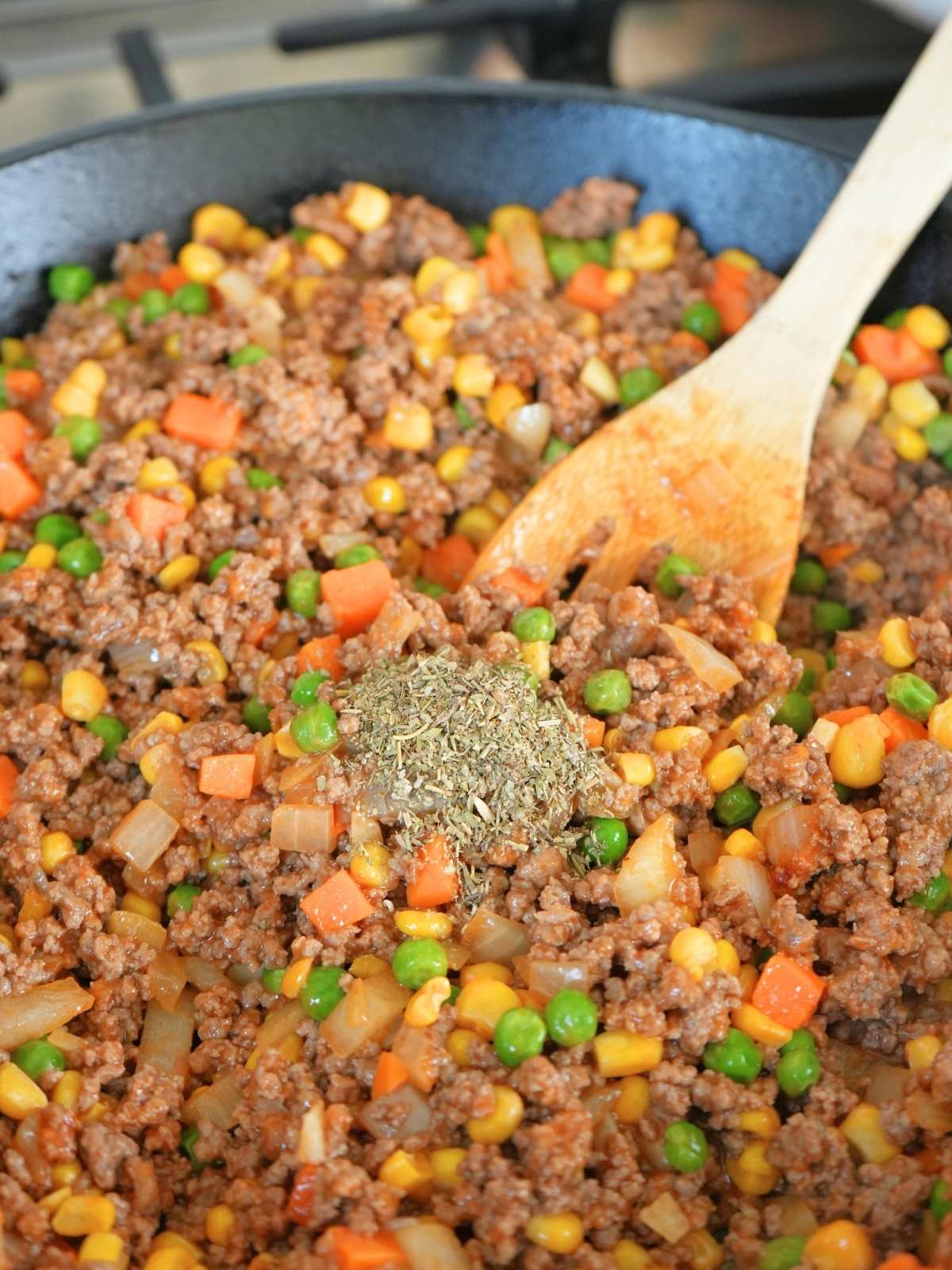 Shepherd's pie with corn filling with Italian seasoning on top.