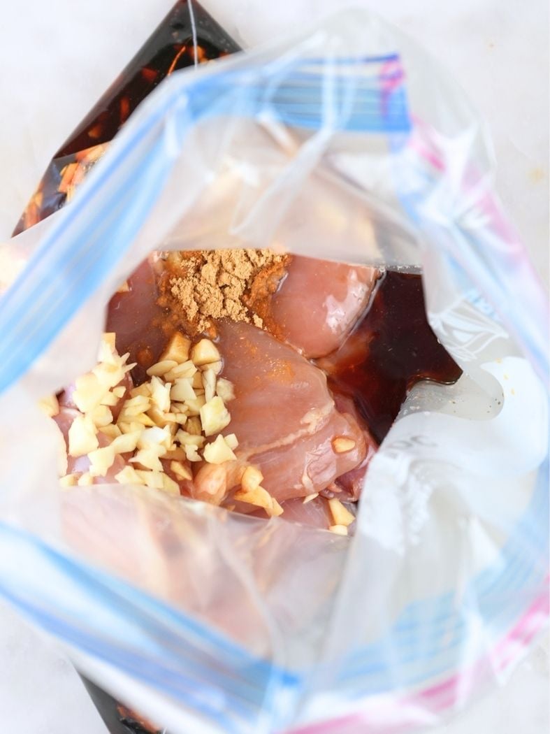 Sauce in a freezer bag, poured over chicken and garlic