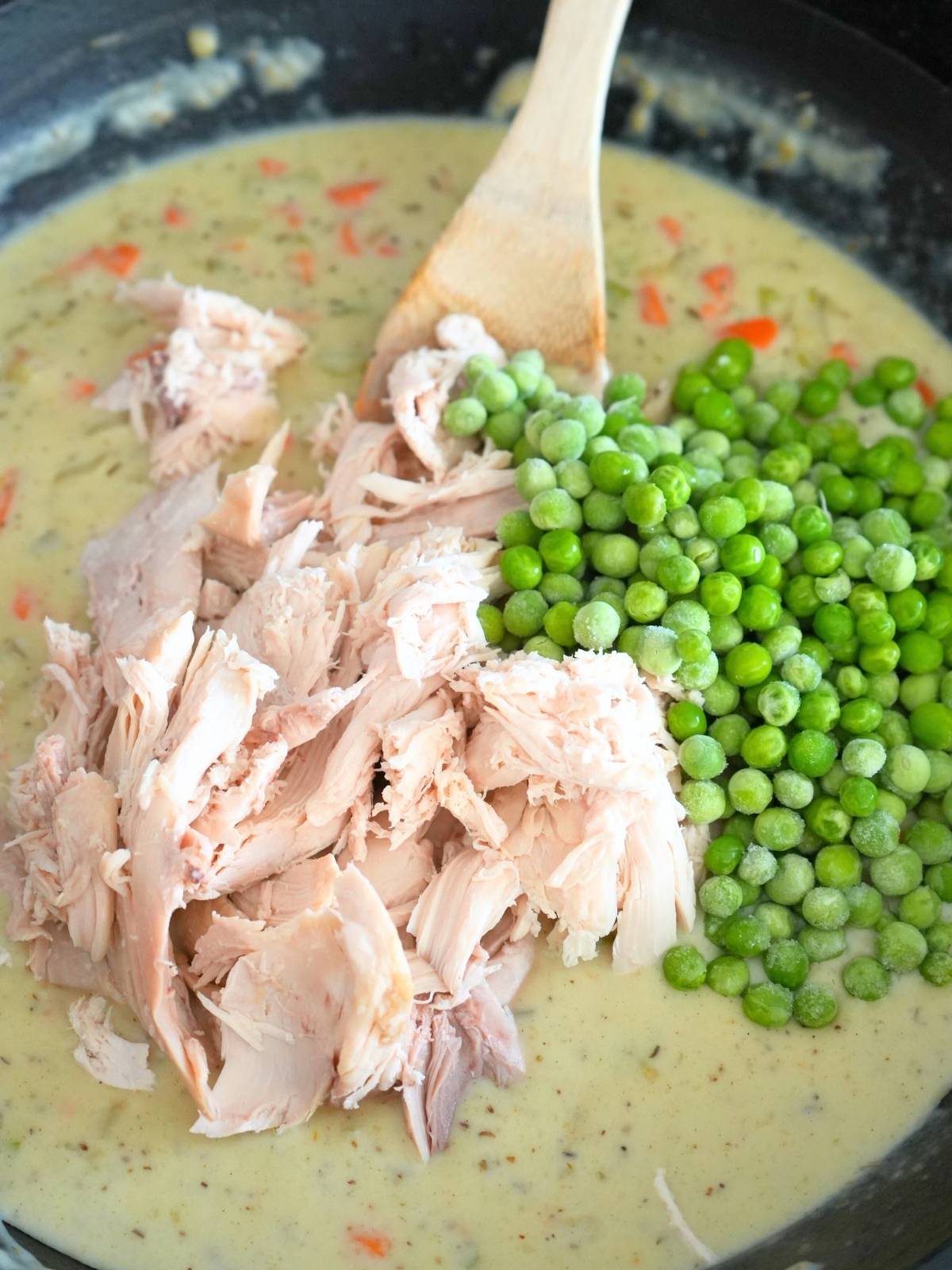 Chicken and frozen peas added to filling.