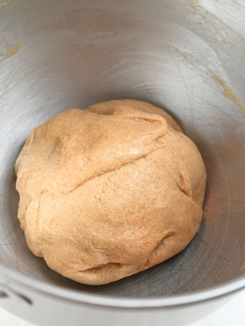 Kneaded dough in a bowl, reading for first rise