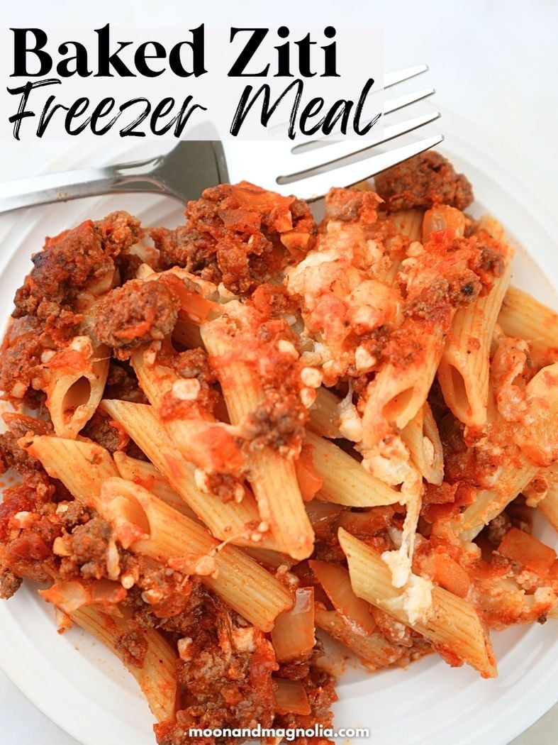 An overhead view of pasta on a plate. Text overlay says, "Baked Ziti Freezer Meal."