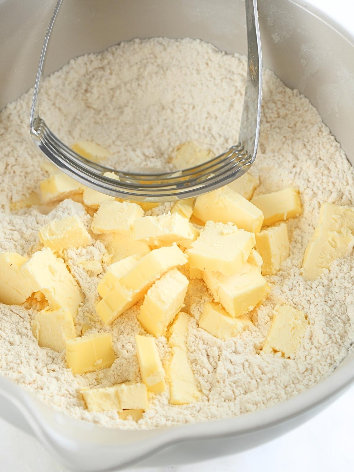 Cubed butter in dry ingredients.