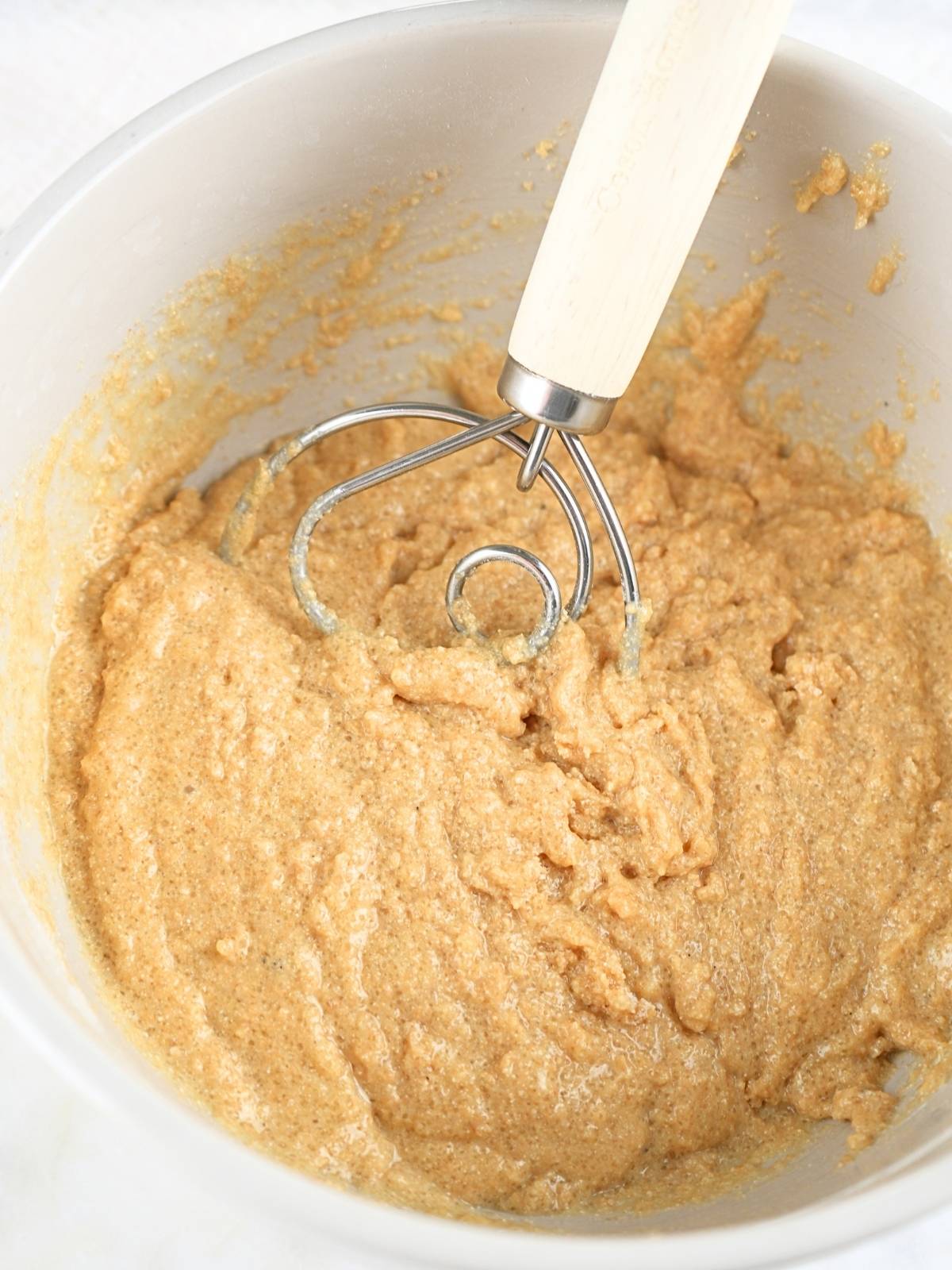 Fresh-milled muffin batter in a mixing bowl.