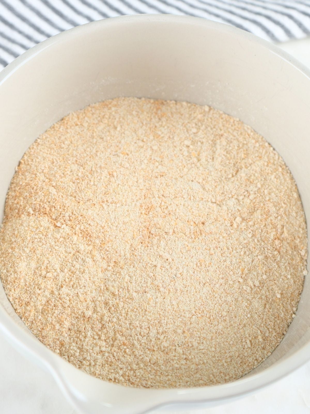 Milled soft white wheat in a bowl.