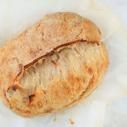 Sourdough croissant bread on parchment paper.