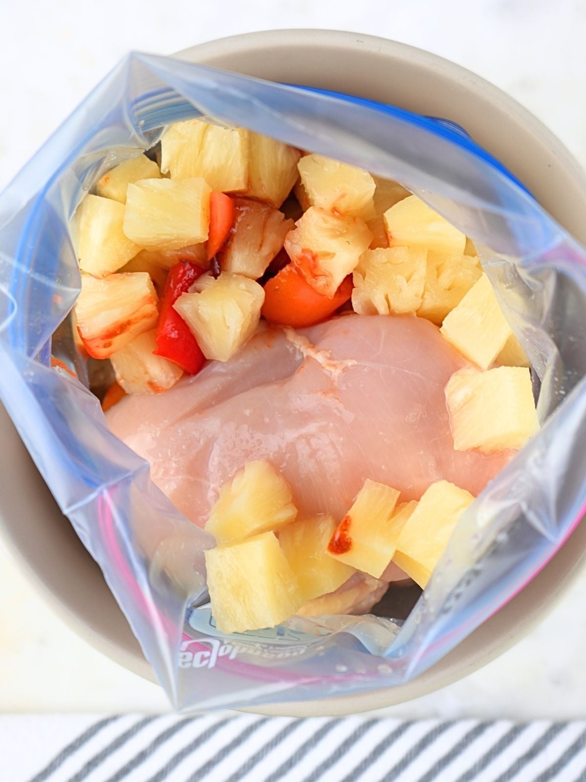 Easy sweet and sour chicken ingredients in a freezer bag.